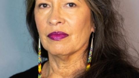 A professional headshot of Judith LeBlanc